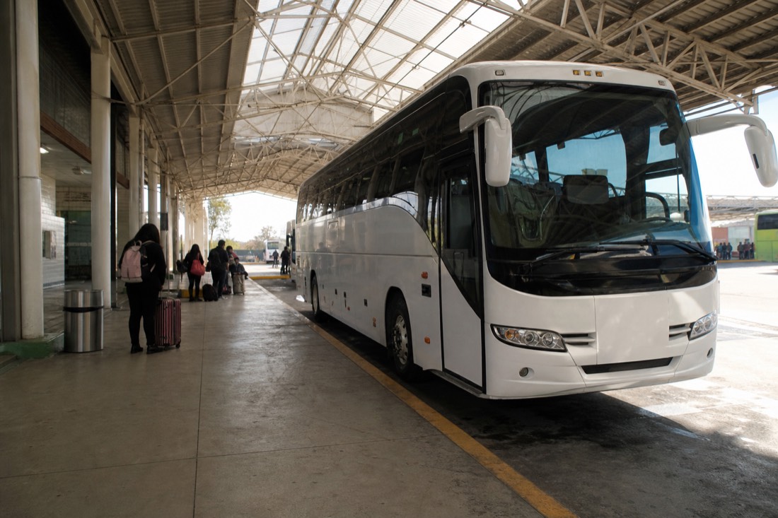 A covered intercity bus terminal platform in Mexico City